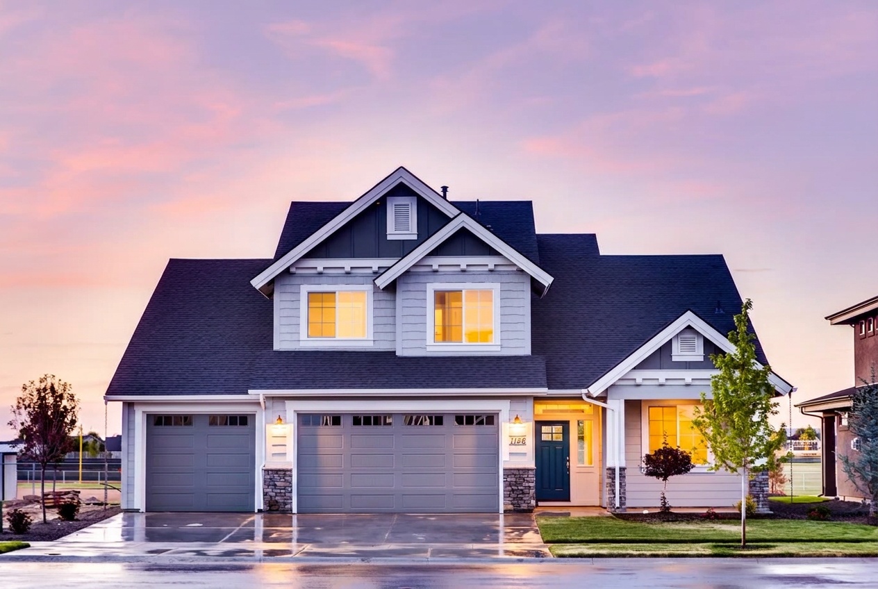 The same home photographed in daylight, transformed into a twilight photo